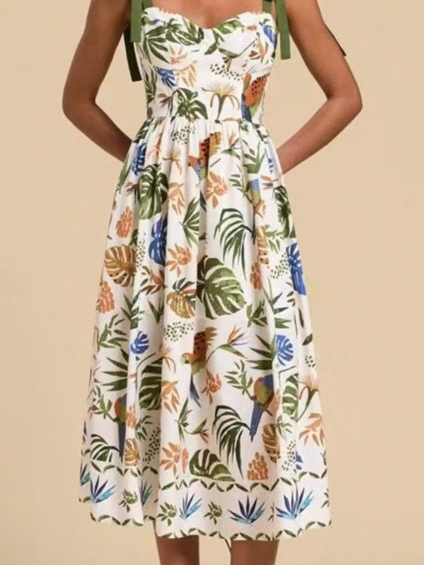 Carmine Juneberry tropical print tie-shoulder sweetheart neck midi dress with vibrant floral pattern and feminine silhouette.