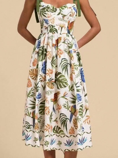 Carmine Juneberry tropical print tie-shoulder sweetheart neck midi dress with vibrant floral pattern and feminine silhouette.