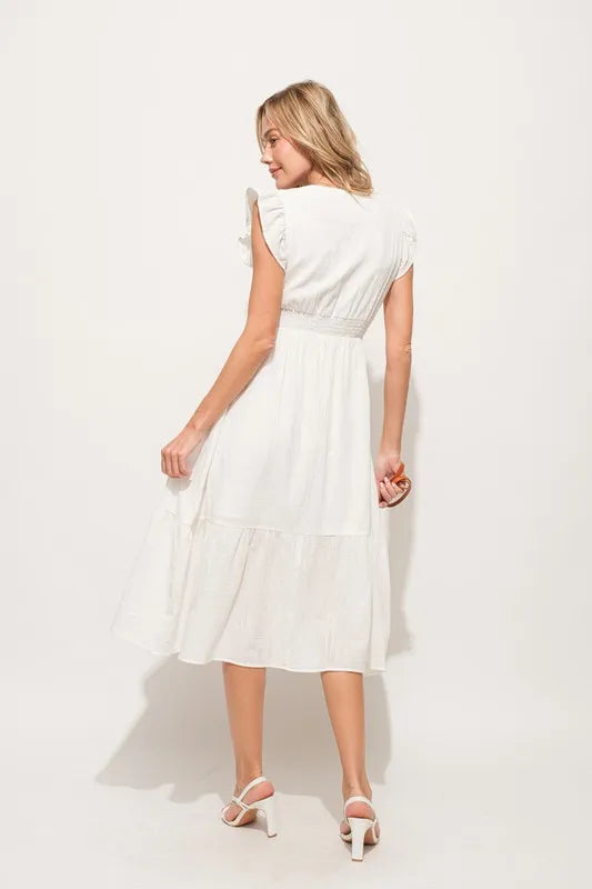Pear Daisy ruffle sleeve front smocked tiered midi dress with floral print, perfect for spring and summer occasions.