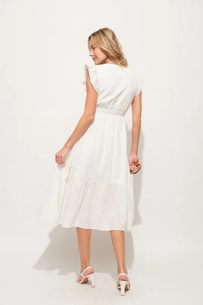 Pear Daisy ruffle sleeve front smocked tiered midi dress with floral print, perfect for spring and summer occasions.