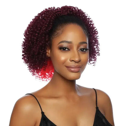 Peach Clymene Roz short curly Afro wig with black hair, styled in voluminous curls, perfect for natural and bold hair looks.