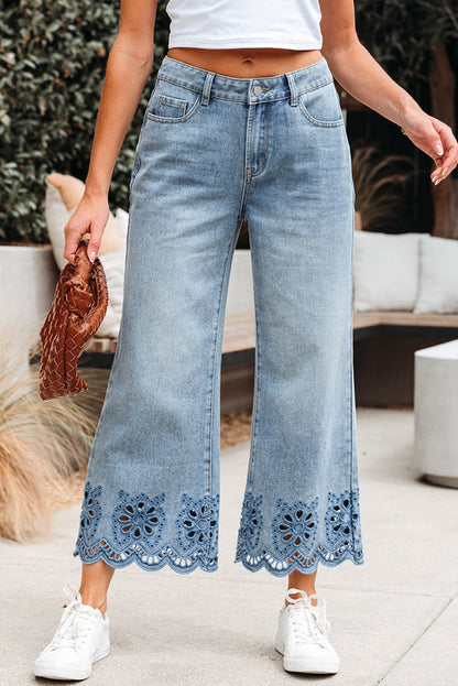 Byzantium Bay solid denim wide-leg jeans with embroidered details, showcasing a relaxed fit and stylish design.