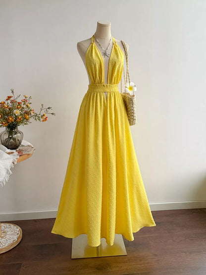 Pear Daisy Swiss Dot Halter Neck Dress, lightweight fabric with dotted pattern, perfect for casual or summer wear.