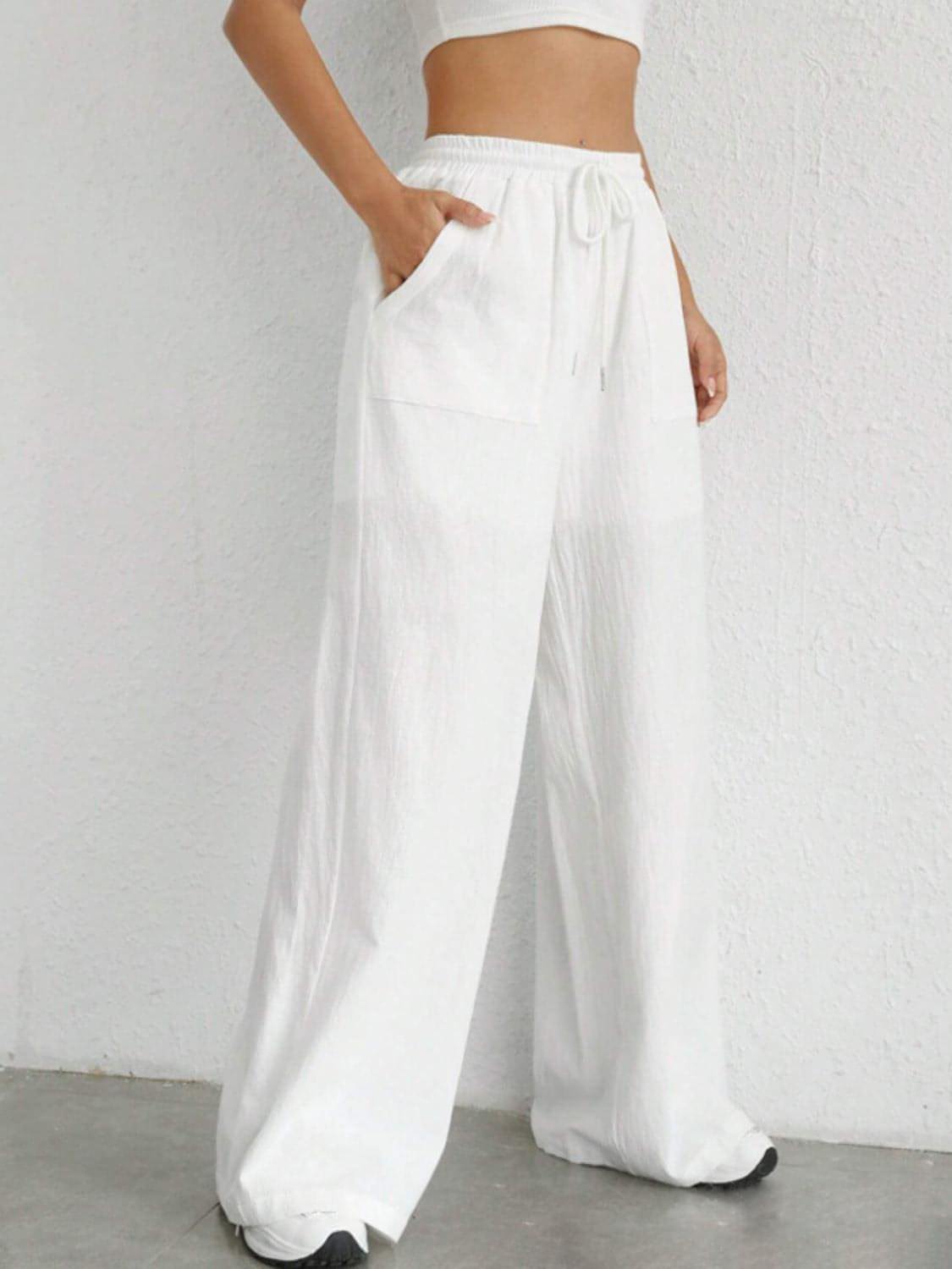 Carmine Juneberry drawstring wide leg pants in lightweight fabric, featuring a relaxed fit and casual style.