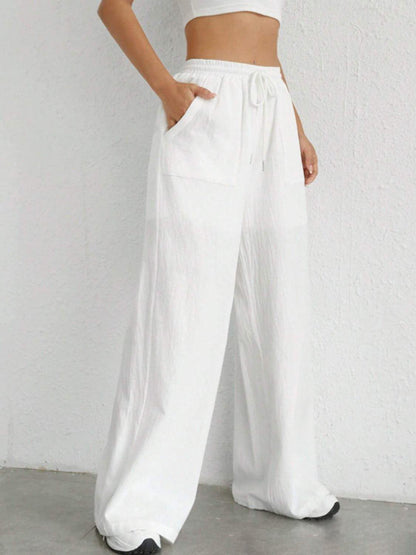 Carmine Juneberry drawstring wide leg pants in lightweight fabric, featuring a relaxed fit and casual style.