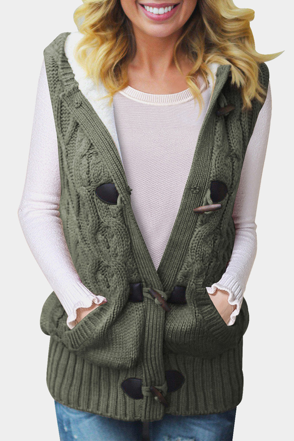 Multicolour cable knit hooded sweater vest by Harlequin Daisy, featuring a cozy, textured design with a front pocket and ribbed trim.