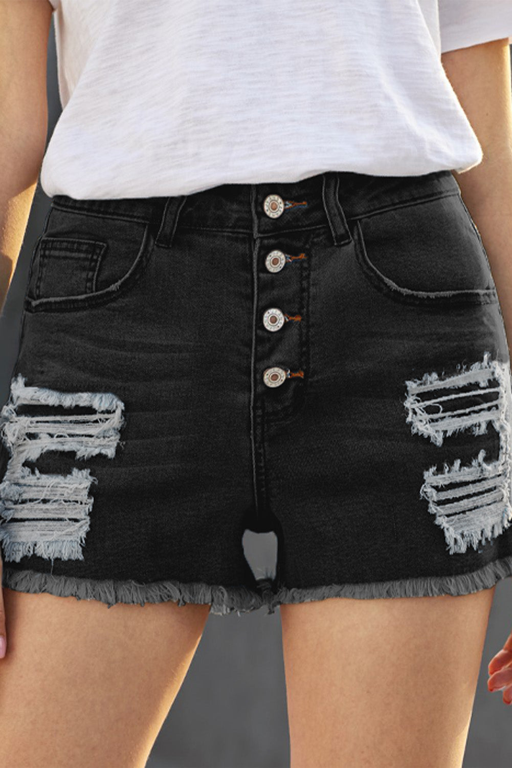 Black gypsy mid-rise distressed denim shorts for women by Lavender Pallas, featuring a casual, edgy style with frayed hems.