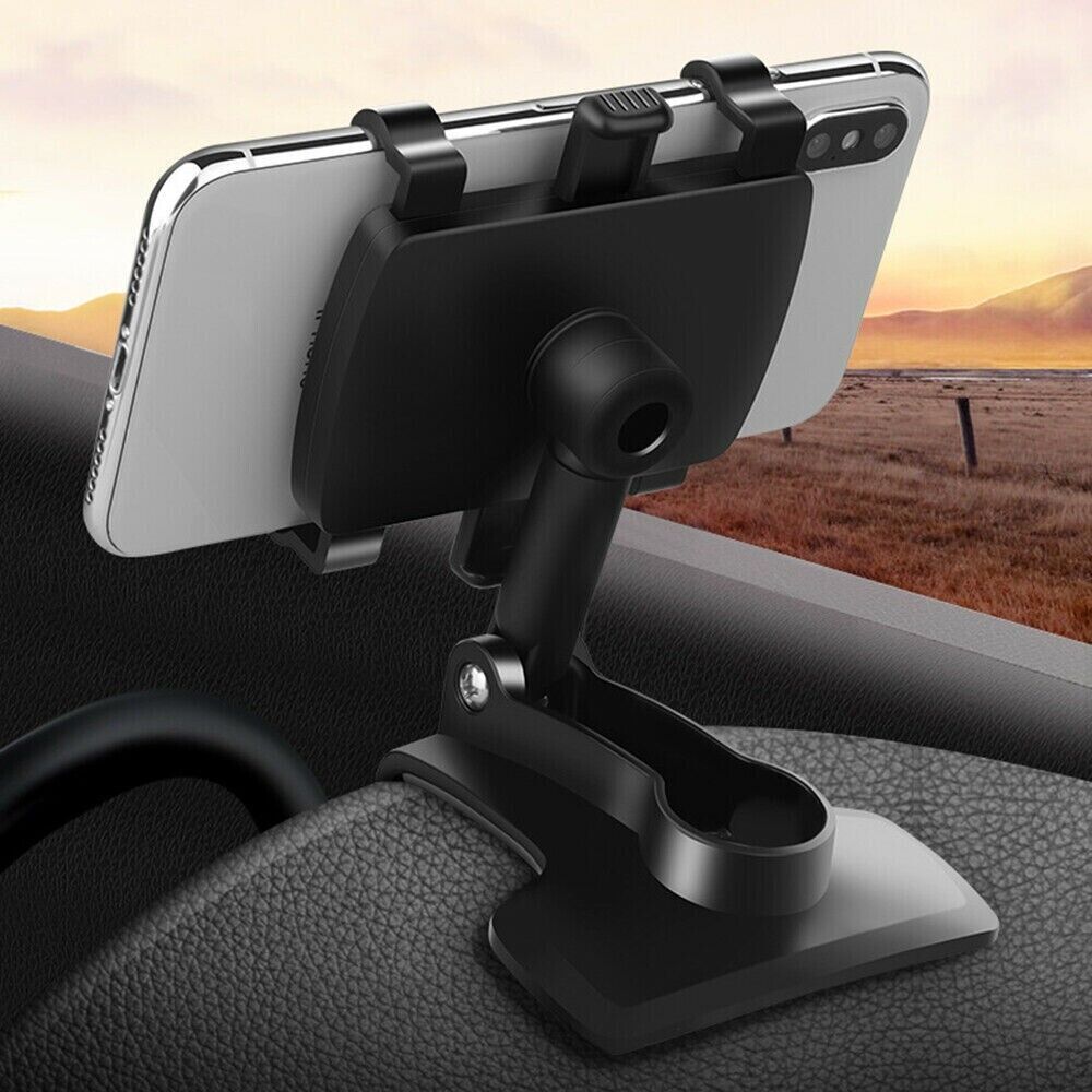 Puce Gaia universal car dashboard mount holder stand with clamp for cell phones, shown attached to vehicle dashboard.