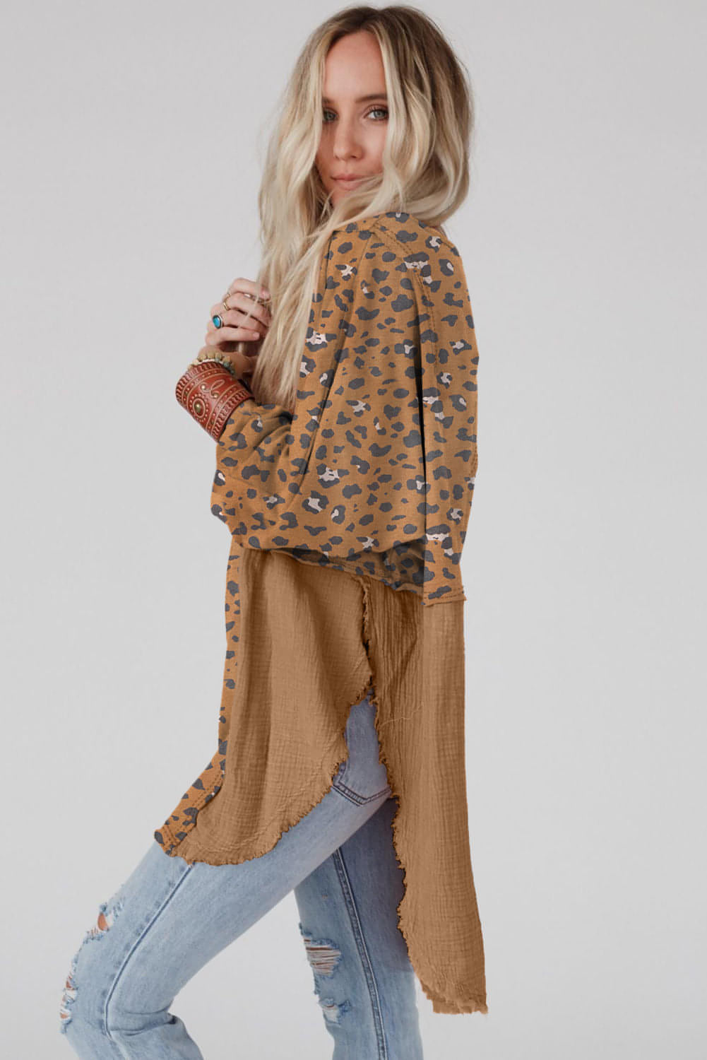 Brown printed raw edge leopard patchwork oversized blouse from Carmine Juneberry, featuring bold animal print and relaxed fit.