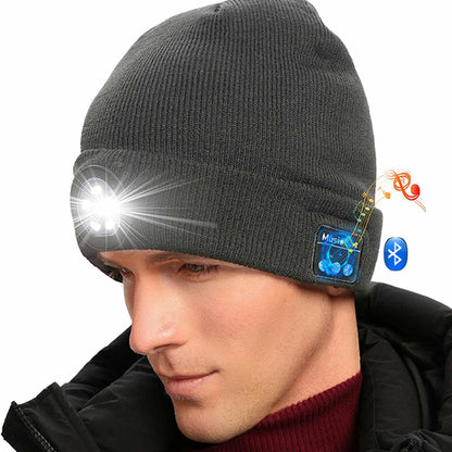 Pink Iolaus wireless Bluetooth LED hat with built-in music speakers and light, designed for outdoor winter activities.