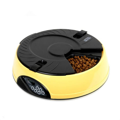 Maroon Asteria pet automatic feeding machine for pets, with digital controls and food dispenser in a home setting