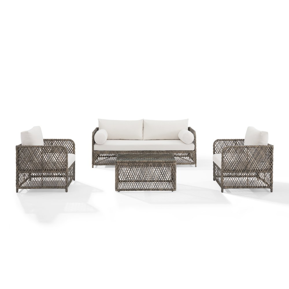 Granite Bay 4-piece outdoor patio furniture set with sofa, coffee table, and two chairs by Start2Finish, shown on a patio.