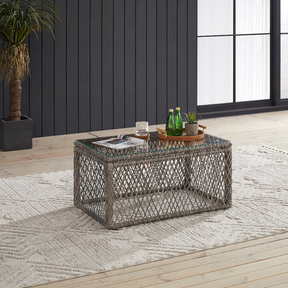 Start2Finish Granite Bay wicker outdoor coffee table with a glass top and woven wicker design for patio or garden use.