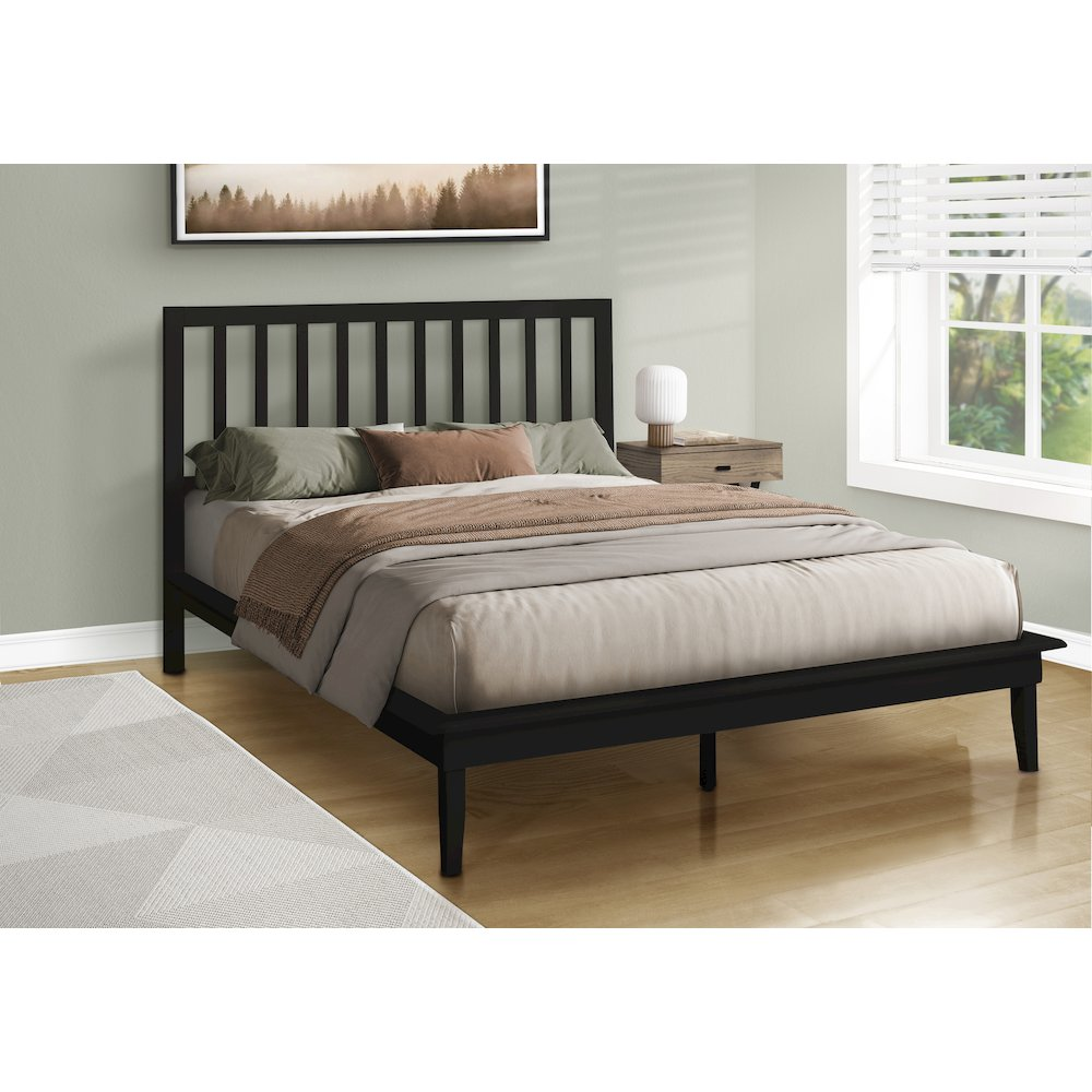Queen size black wood leg platform bed with a contemporary design, featuring a sleek frame and minimalist style.