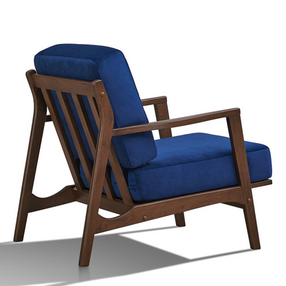 Blue Jasper accent armchair with solid wood frame and velvet upholstery, featuring cushioned seat and stylish armrests.
