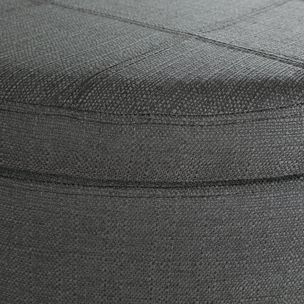 Start2Finish Alloway storage ottoman in charcoal fabric with antique bronze nailhead accents, showing its cushioned top and side storage space.