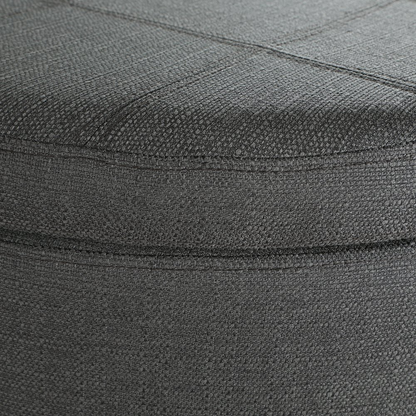Start2Finish Alloway storage ottoman in charcoal fabric with antique bronze nailhead accents, showing its cushioned top and side storage space.