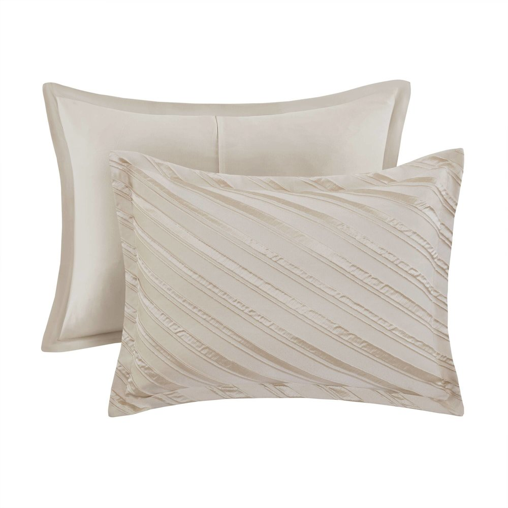 Start2Finish Riva 7-piece beige comforter set with matching pillow shams and decorative cushions on a bed.