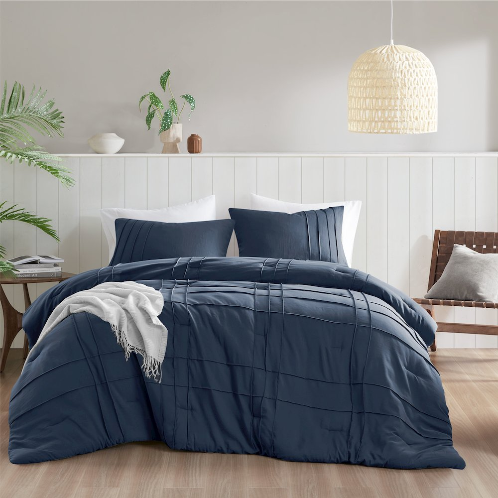 Start2Finish Porter soft washed navy pleated comforter set with textured bedding design on a bed.