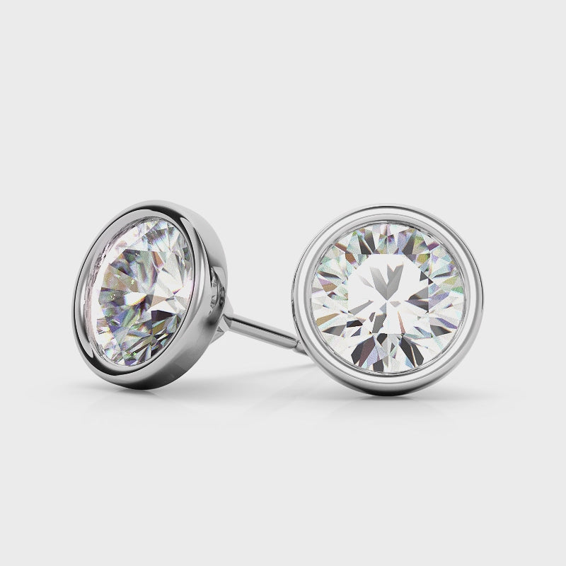 Round lab-grown diamond stud earrings in 14K white or yellow gold, 2.00 or 3.00 carat total weight, bezel setting by Start2Finish.