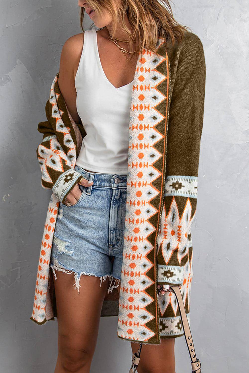 Brown Aztec print open front knitted cardigan by Carmine Juneberry, featuring a stylish woven pattern and cozy knit texture.