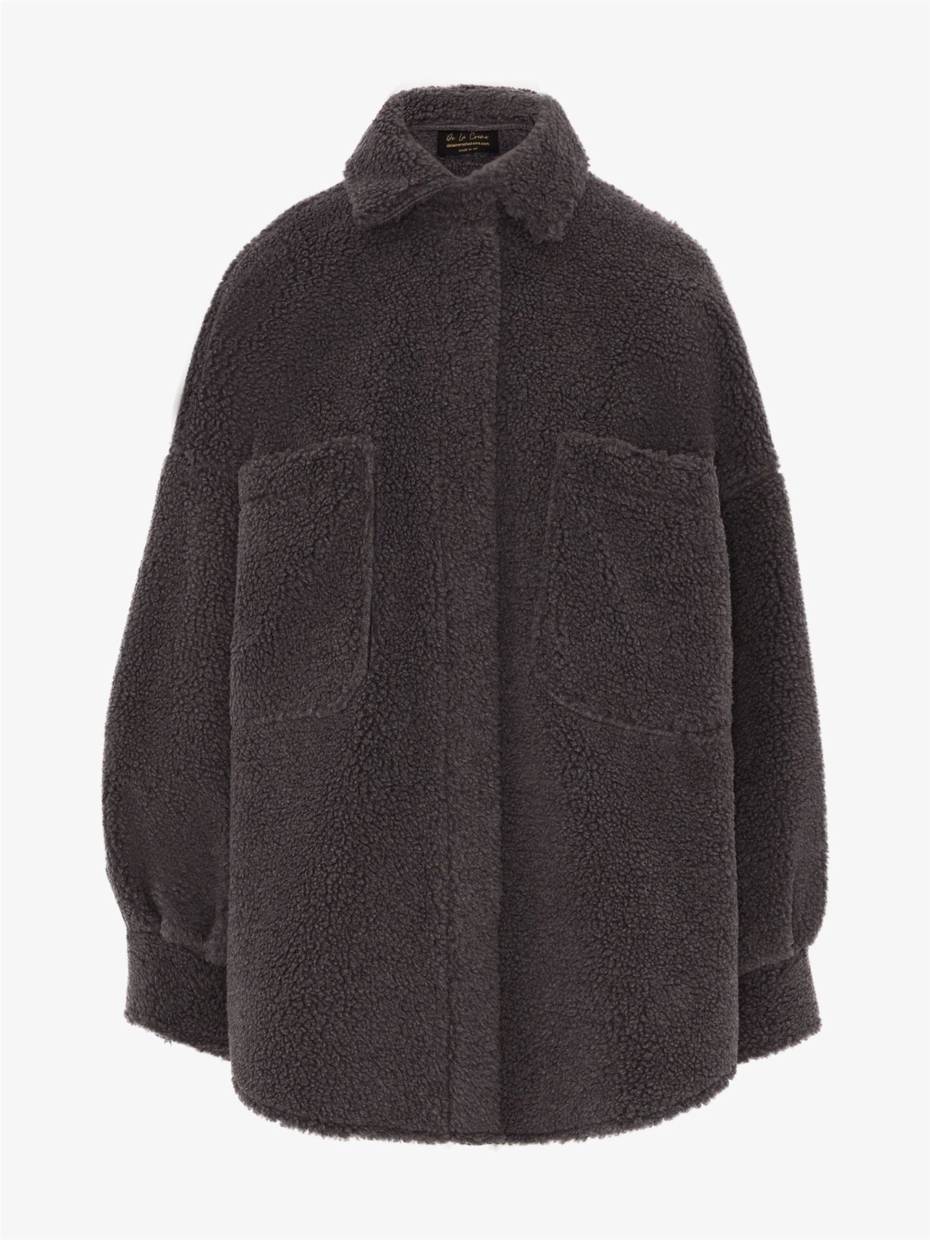 Rose Eleusis oversized patch pocket borg teddy shacket showing a cozy, plush faux shearling jacket with large patch pockets.