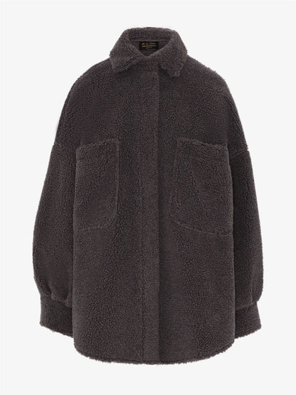 Rose Eleusis oversized patch pocket borg teddy shacket showing a cozy, plush faux shearling jacket with large patch pockets.