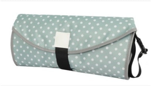 Soft baby changing pad from CJDropshipping, featuring a cushioned surface and secure sides for comfortable diaper changes.