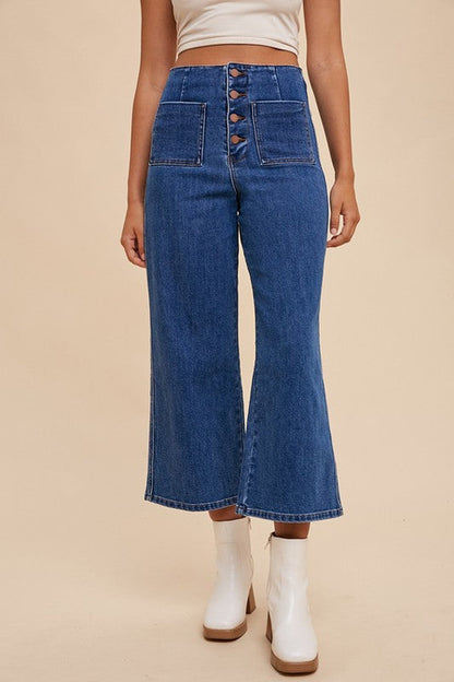 Jade Icarus Annie Wear button fly high waist jeans with classic denim look and visible stitching, shown on a hanger.