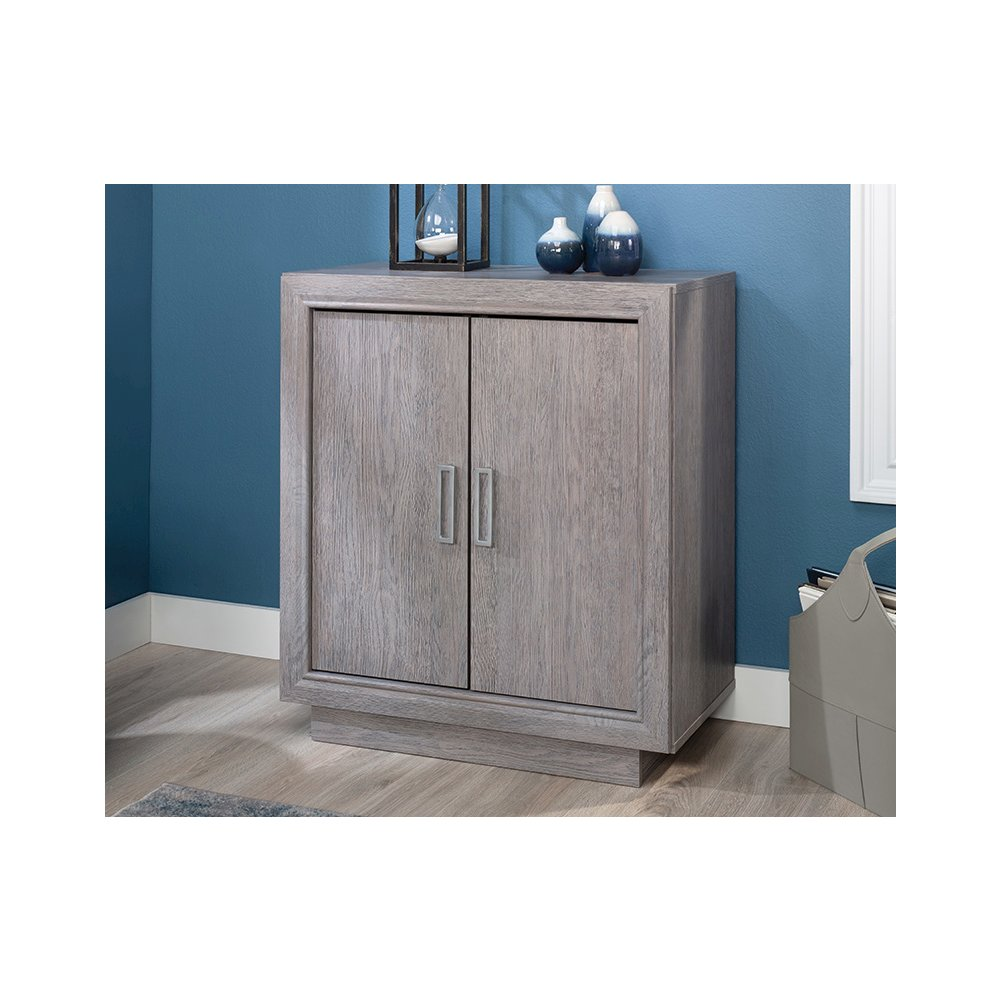 Start2Finish Hayes garden storage cabinet in Ashen Oak finish with double doors and storage shelves for outdoor organization.