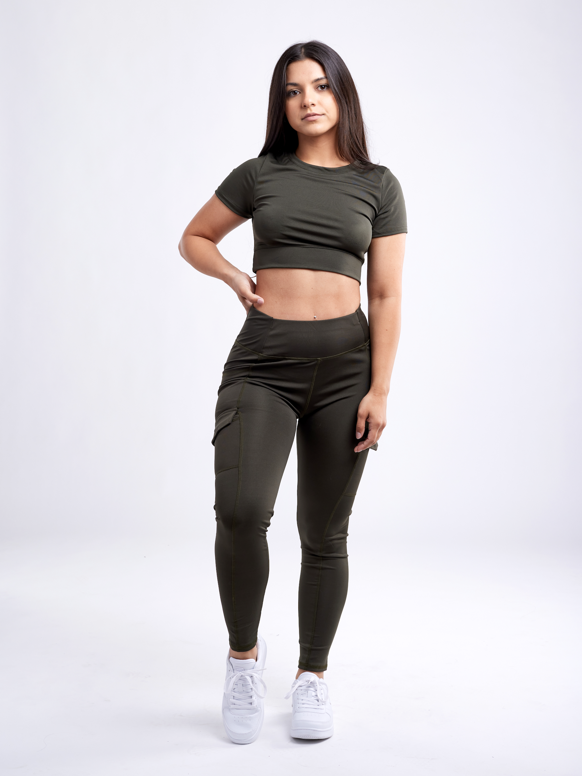 Sky Iapetus JupiterGear short-sleeve crop top for activewear, featuring a fitted design and breathable fabric in a vibrant color.