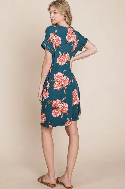Jade Icarus floral round neck short tee dress with pockets, featuring a vibrant floral pattern and casual fit.