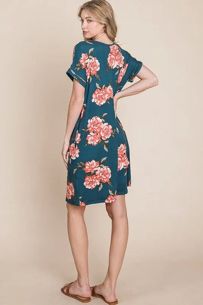 Jade Icarus floral round neck short tee dress with pockets, featuring a vibrant floral pattern and casual fit.