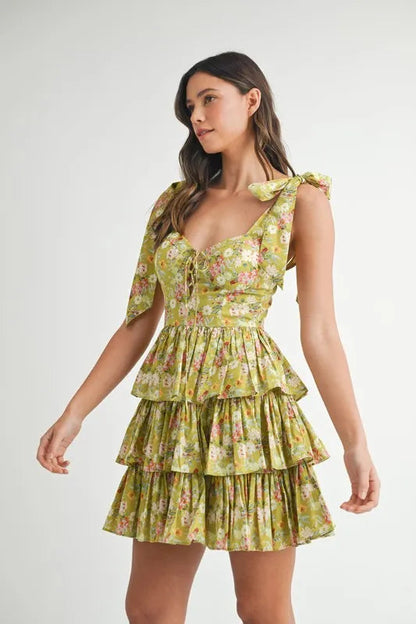 Pear Daisy MABLE floral print shoulder tie layered mini dress, showcasing vibrant floral pattern and layered design.