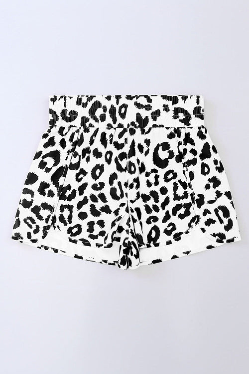Leopard and checker high waist athletic shorts by Byzantium Bay featuring bold animal print and comfortable fit.