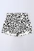 Leopard and checker high waist athletic shorts by Byzantium Bay featuring bold animal print and comfortable fit.