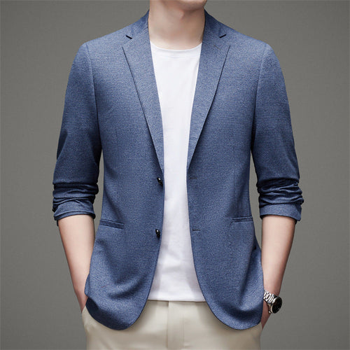 Carmine Juneberry Metropolitan Slim-Fit Blazer from Haute Edition 25, shown in a tailored dark fabric with lapel detail.