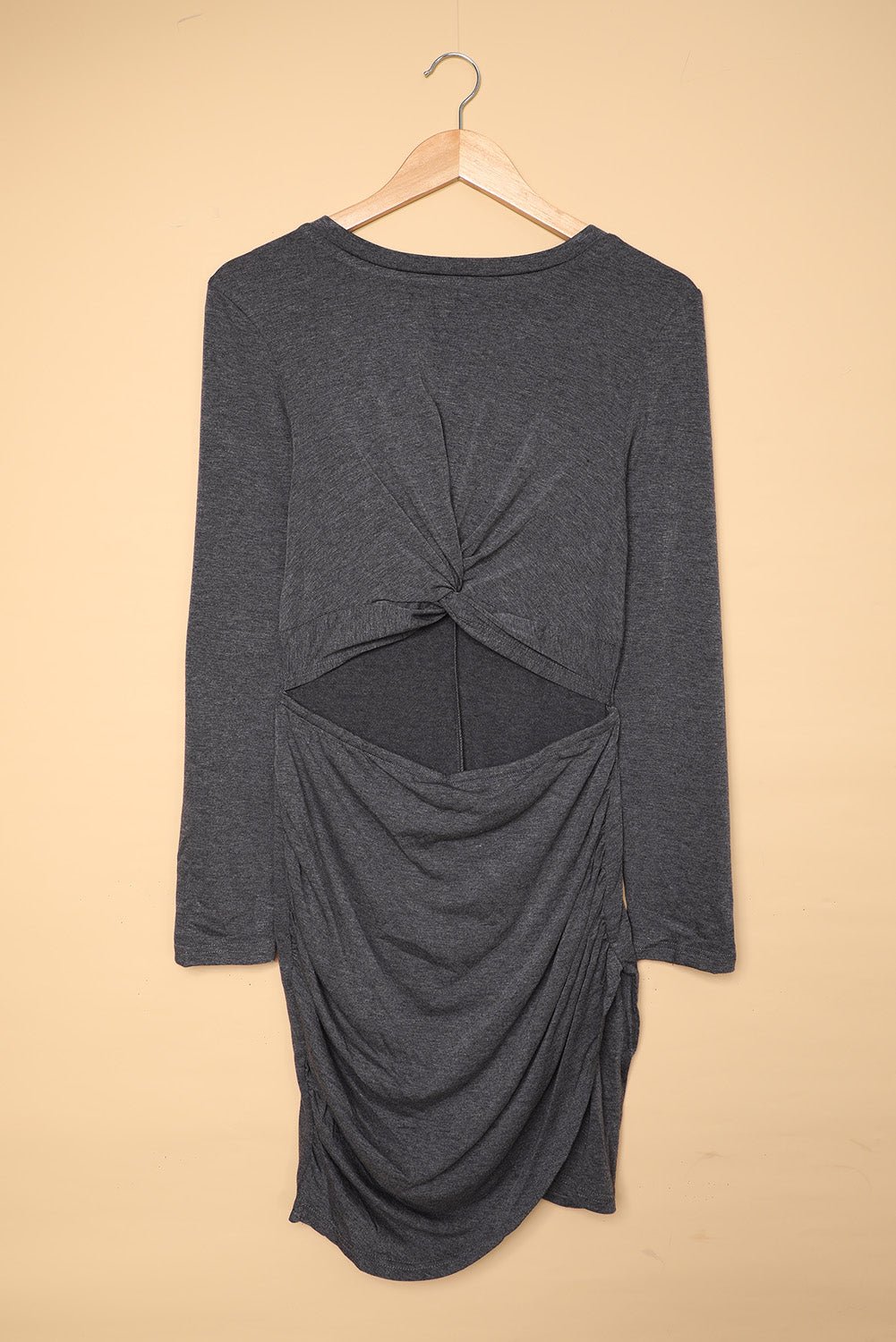Gray long sleeve cut-out twist ruched bodycon mini dress by Harlequin Daisy, featuring a stylish fitted design and unique ruched details.