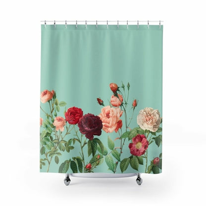 Teal shower curtain with rose garden design from Yellow Pandora, showcasing floral patterns for bathroom decor.