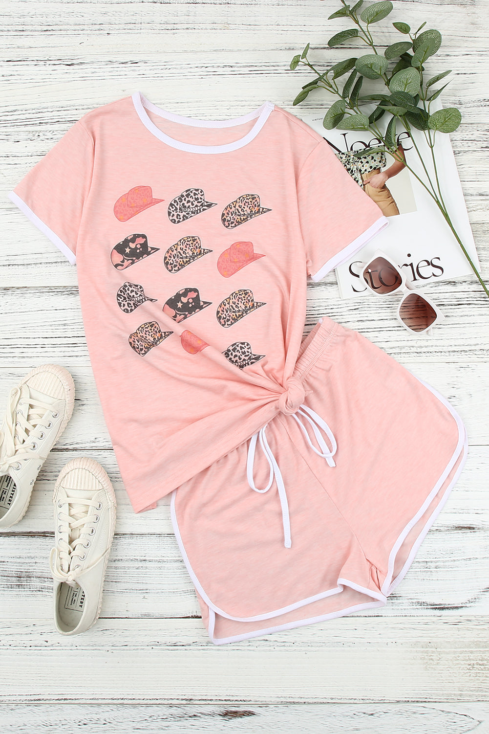 Pink leopard print short sleeve T-shirt and drawstring shorts set by Harlequin Daisy, casual bath and beauty loungewear ensemble.