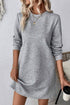 Gray solid color textured long sleeve shift dress by Carmine Juneberry, showing a close-up of the fabric and dress silhouette.