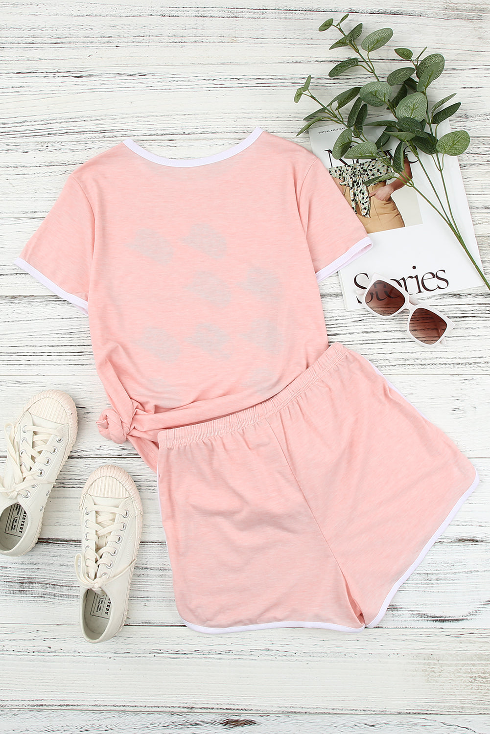 Pink leopard print short sleeve T-shirt and drawstring shorts set from Harlequin Daisy, perfect for casual bath and beauty wear.