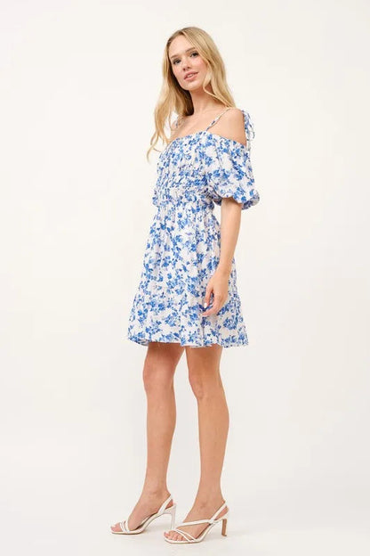 Automotive product image featuring Jade Icarus And The Why Off Shoulder Bubble Sleeve Dress with unique design details.