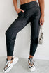 Black exposed seam high waist joggers with pockets from Carmine Juneberry, showcasing a stylish and comfortable gift option.
