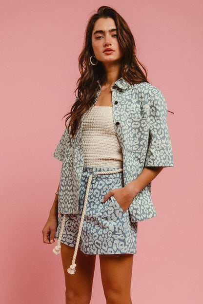 Leopard print shorts with BiBi Rope belt from Jade Icarus, featuring automotive-inspired design and stylish, casual fit.