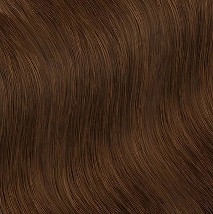 Light brown short human hair wig with loose curls by Peach Clymene, showcasing soft, natural-looking curly hair style.