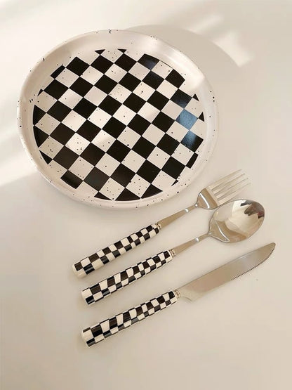 Six-piece set of modern checkered flatware from Inspecial Home, featuring sleek stainless steel utensils for stylish table setting.