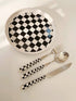 Six-piece set of modern checkered flatware from Inspecial Home, featuring sleek stainless steel utensils for stylish table setting.