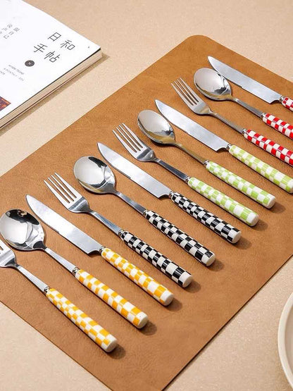 Six modern checkered flatware sets by Inspecial Home, featuring sleek design for home decor and table setting.