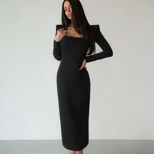 Carmine Juneberry long skirt with square neck, slim fit in a stylish design, shown in a natural pose highlighting the fabric and fit.